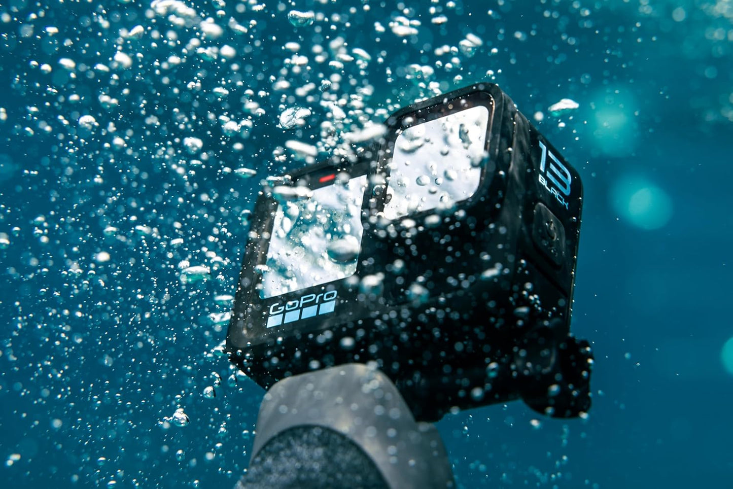 GoPro HERO13 Black Accessory Bundle - Includes The Handler, 2 Enduro Batteries, 2 Curved Adhesive Mounts, 64GB SanDisk MicroSD Card, and Carrying Case